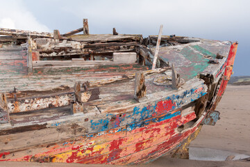 A wooden shipwreck on a beach (crow point, Devon, UK)