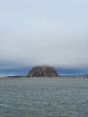 Fototapeta na wymiar Morro Rock Covered by Clouds