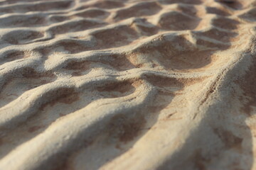sand that forms waves, due to waves of water currents. natural background