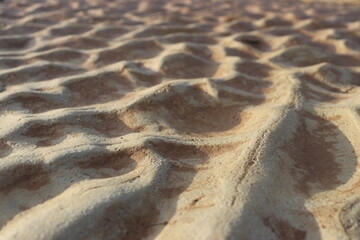 sand that forms waves, due to waves of water currents. natural background