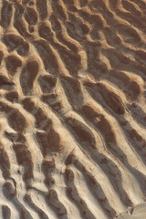 sand that forms waves, due to waves of water currents. natural background