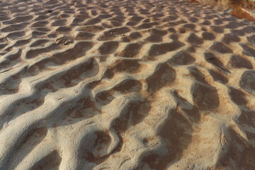 sand that forms waves, due to waves of water currents. natural background