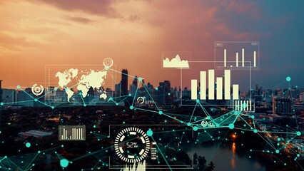 Business data analytic interface fly over smart city showing alteration future of business intelligence. Computer software and artificial intelligence are used to analyze big data for strategic plan .