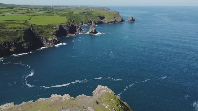 Aerial drone shot of Boscastle, harbour and its rugged coastline. Picturesque seaside village in Cornwall, England.