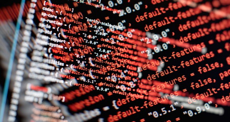 Security code on a computer display, close up. Database bits access stream visualisation. Php...