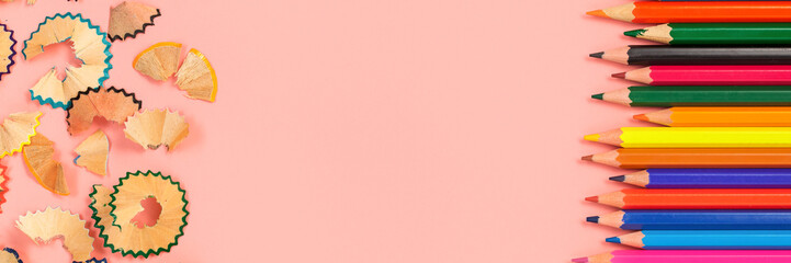 Colorful pencils on a blue background.