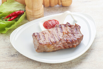 Grilled rib-eye steak beef meat