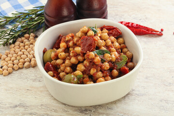 Chickpea beans with dry tomato and olives