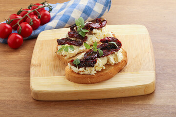 Bruschetta with soft cheese and tomato