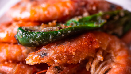 Fried king shrimps close-up, tasty, crispy, large, photo with shallow depth of field. Delicious food concept.