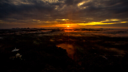 high mountain nature background that can see the scenery around, the fog covers the trees in a blur, the cool air, the beauty of the ecosystem