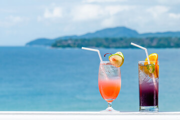 Two cocktails at luxury tropical resort.