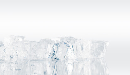 Ice cubes background. Heap of pure ice cubes on a reflective white surface.
