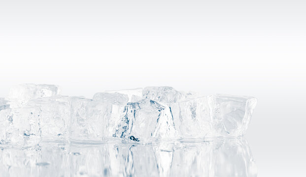 Ice cubes background. Heap of pure ice cubes on a reflective white surface.