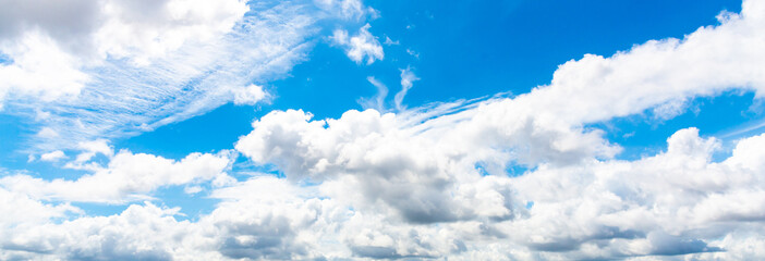 Panorama blue sky with white soft clouds. landscape image of blue sky and thin clouds.