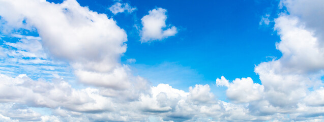 Panorama blue sky with white soft clouds. landscape image of blue sky and thin clouds.