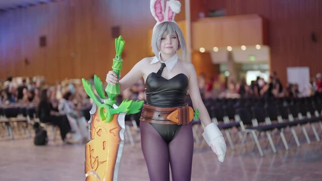 Cute cosplay character Battle Bunny River from League of Legends game at comic con 4K