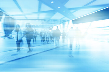 Fototapeta premium group of people movement blurred light background inside