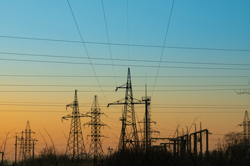 power line pole, in the photo there is a power line pole and wires against the blue sky