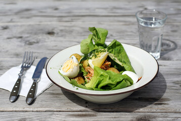 Healthy salad meal on table outdoors