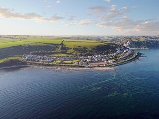 Aerial drone shot of Looe, picturesque seaside village in Cornwall, South west England, United Kingdom. © Roberto