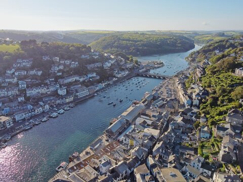 Aerial drone shot of Looe, picturesque seaside village in Cornwall, South west England, United Kingdom.