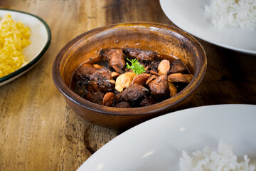 Pork salpicao in a bowl served with rice