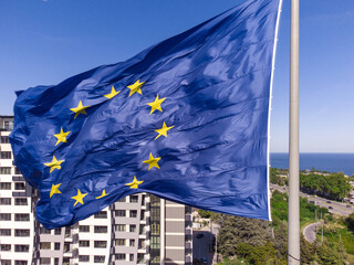 European union flag Against City at summer day