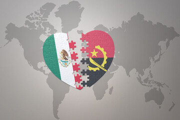 puzzle heart with the national flag of angola and mexico on a world map background.Concept.