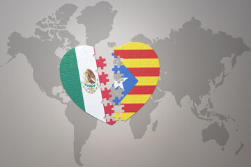 puzzle heart with the national flag of catalonia and mexico on a world map background.Concept.