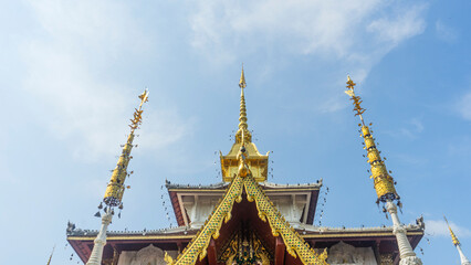 Thai temple decorated with gold and white