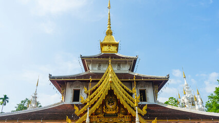 Thai temple decorated with gold and white
