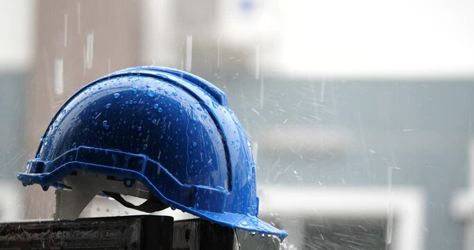heavy rain and construction safety helmets, blue hard safety helmet and raining