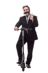 businessman with electric scooter showing OK gesture. isolated on white