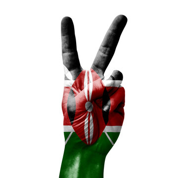 Hand Making The V Victory Sign With Flag Of Kenya