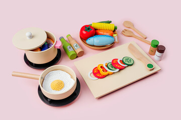 Cute kids toys to play in the kitchen. Wooden fruit and vegetables play set. Educational toys. Healthy food concept. Learning and development of the child