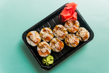 A traditional Japanese dish made from rice and fish.
Photo taken in a sushi bar in Vinnytsia