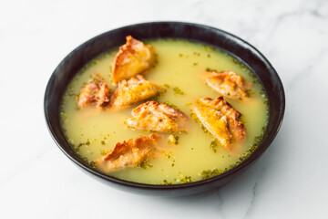 healthy plant-based food, homemade Chinese wonton dumplings soup with lentil carrot and onion filling