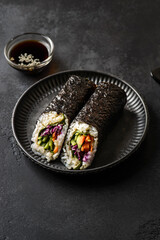 nori roll on black background