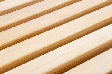 white wooden boards parallel to each other, a diagonal of boards