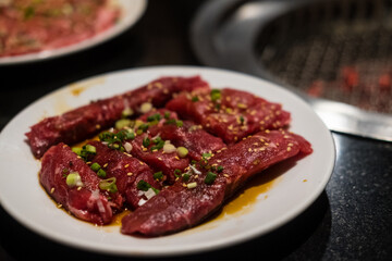 Raw beef slice for barbecue or Japanese style yakiniku