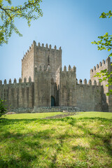 Obraz premium The Castle of Guimaraes in the northern region of Portugal. It was built at the end of the 13th century following French influences.