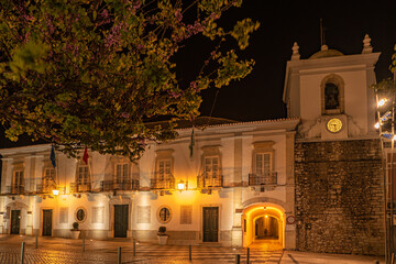 The city council in the old town of Loule at the Algarve, Portugal. Town hall illuminated at night