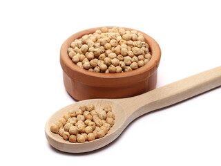 Raw chickpeas pile in wooden spoon isolated on white  