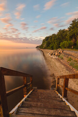 Sunrise over the pier in Mechelinki.