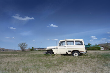 Old abandoned vehicle in the badlands at Dorothy, Alberta, Canada
