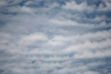 Obraz premium Clouds on the blue sky nature with space background wallpaper