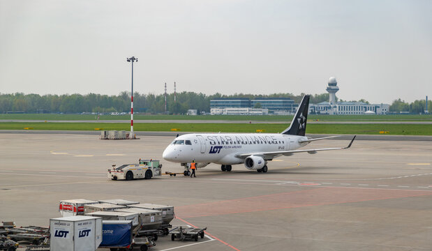 Warsaw, Poland - May 6, 2022: A picture of a Star Alliance - LOT Polish Airlines plane taxiing on the Chopin Airport.