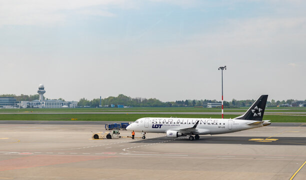 Warsaw, Poland - May 6, 2022: A picture of a Star Alliance - LOT Polish Airlines plane taxiing on the Chopin Airport, in Warsaw.