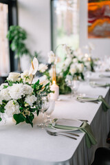 Stylish wedding table decoration and table setting. Vintage blue flowers